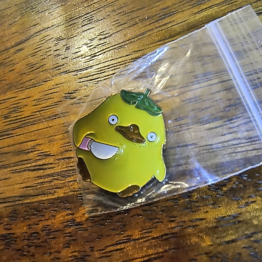 Yellow cartoon bird with knife enamel pin backpack hat clothes bag cap denim